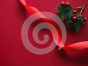 Christmas flatlay and holiday design concept. Decoration, ornament and xmas gift wrapping on red paper background as