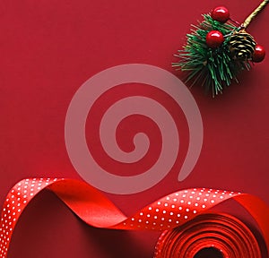 Christmas flatlay and holiday design concept. Decoration, ornament and xmas gift wrapping on red paper background as