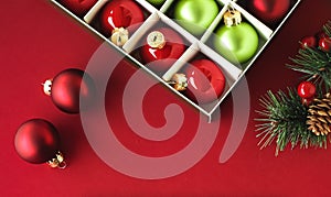 Christmas flatlay and holiday design concept. Decoration, ornament and xmas gift wrapping on red paper background as