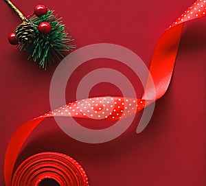 Christmas flatlay and holiday design concept. Decoration, ornament and xmas gift wrapping on red paper background as