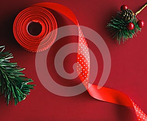 Christmas flatlay and holiday design concept. Decoration, ornament and xmas gift wrapping on red paper background as