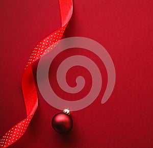 Christmas flatlay and holiday design concept. Decoration, ornament and xmas gift wrapping on red paper background as