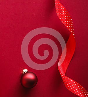 Christmas flatlay and holiday design concept. Decoration, ornament and xmas gift wrapping on red paper background as