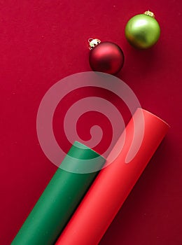 Christmas flatlay and holiday design concept. Decoration, ornament and xmas gift wrapping on red paper background as