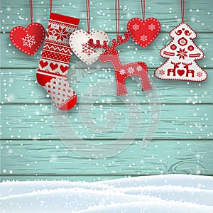 Christmas folklore decorations hanging in front of blue wooden wall, illustration