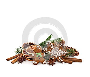 Christmas food decoration. Twig christmas tree, christmas gingerbread, cones spruce, dried oranges, cinnamon sticks and stars