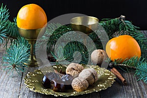 Christmas food still life: arabic dates, walnuts, spices