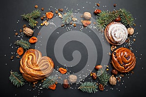 Christmas frame of fresh baked goods on a black background. Space for the text