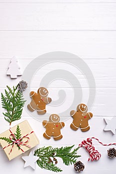 Christmas frame with gingerbread cookies, Christmas tree, pine cones, toys. Copy space for text. winter holidays.