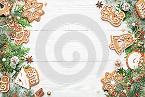 Christmas frame with rustic ornaments and Gingerbread cookies on