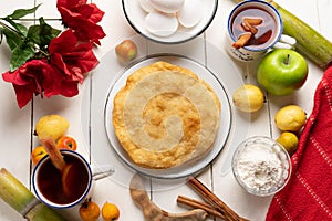 Christmas fritters with piloncillo and cinnamon on a white background. Mexican food photo