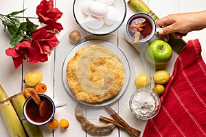 Christmas fritters with piloncillo and cinnamon on a white background. Mexican food photo