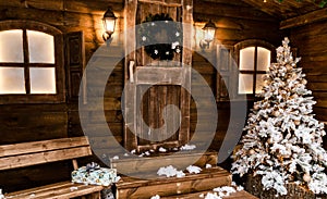 Christmas front door of a country house background. Concept Happy Christmas, New Year, holiday, winter, greetings