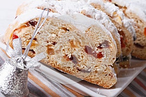 Christmas fruit cake Stollen sliced macro horizontal