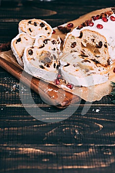 Christmas fruit cake with sugar powder on marble board