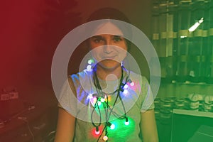 Christmas funny portrait. Funky young woman celebrating christmas. Young person having fun on winter holiday time with