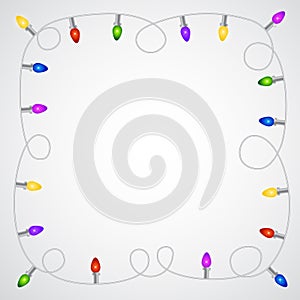 Christmas garland with colorful light bulbs