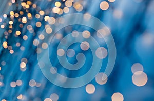 Christmas garland lights over dark blue background