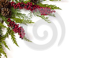 Christmas Garland with Pine Cones and Berries on white