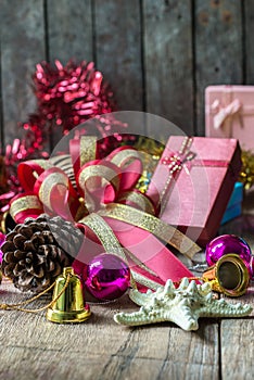 Christmas garland on rustic wooden background