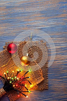 Christmas garlands of lamps on a wooden background