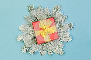 Christmas gift on blue background. Xmas holidays concept