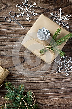 Christmas gift box. Christmas presents in handmade boxes on a wooden table.