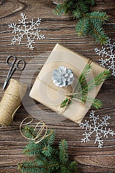 Christmas gift box. Christmas presents in handmade boxes on a wooden table.