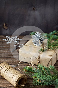 Christmas gift box. Christmas presents in handmade boxes on a wooden table