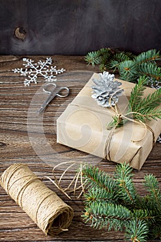 Christmas gift box. Christmas presents in handmade boxes on a wooden table