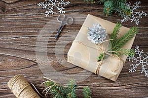 Christmas gift box. Christmas presents in handmade boxes on a wooden table