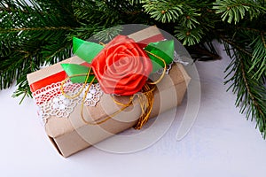 Christmas gift box decorated with lace and red silk rose