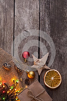 Christmas gift box and decorations on wooden background copy spa