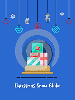 Christmas gift box in snow globe icon with christmas ornament elements hanging