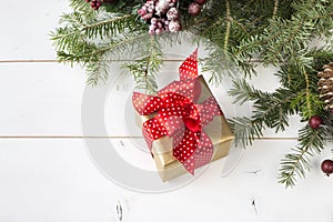Christmas gift box on wooden background photo
