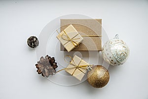Christmas gift boxes , balls on white background