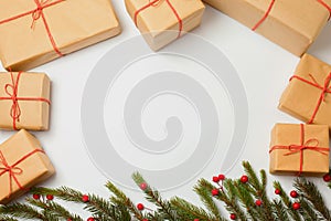 Christmas gift boxes and christmas tree on white background