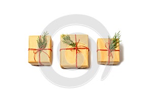 Christmas gift boxes and christmas tree on white background