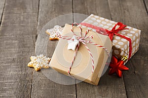 Christmas gift boxes decorated with red ribbon and twine