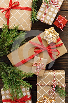 Christmas gift boxes and decoration on wooden background