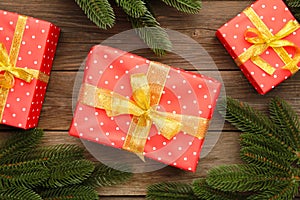 Christmas gift boxes with decorations on grey wooden background. Thanksgiving Day