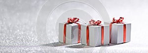 Christmas gift boxes on glitters