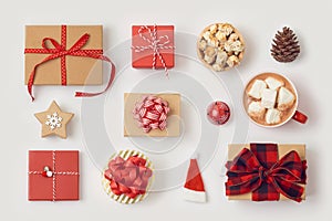 Christmas gift boxes and hot chocolate cup on white background