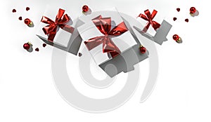 Christmas gift boxes with red ribbon and decoration on white background with bokeh, light. Xmas and Happy New Year holiday