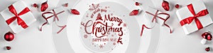 Christmas gift boxes with red ribbon and decoration on white background. Xmas and Happy New Year theme, snow