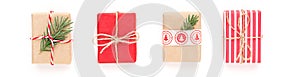 Christmas gift composition. New year flatly with red dotted and craft gifts at grey background. Xmas concept.