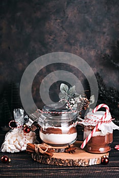 Christmas gift cookie mix and chocolate drink in glass jar