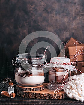 Christmas gift cookie mix and chocolate drink in glass jar