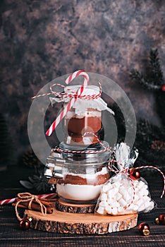 Christmas gift cookie mix and chocolate drink in glass jar