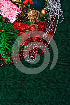 Christmas, New Year green stylish background and frame with pink gifts box and green gift bag with red bow, copy space